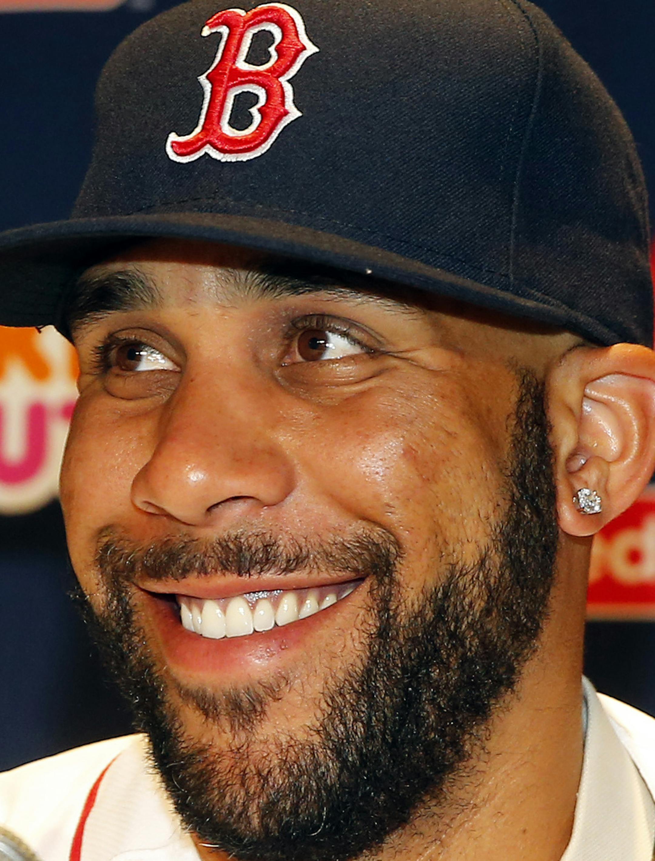 Boston Red Sox pitcher David Price smiles at a news conference announcing his signing by the team at Fenway Park in Boston, Friday, Dec. 4, 2015. (AP Photo/Winslow Townson)