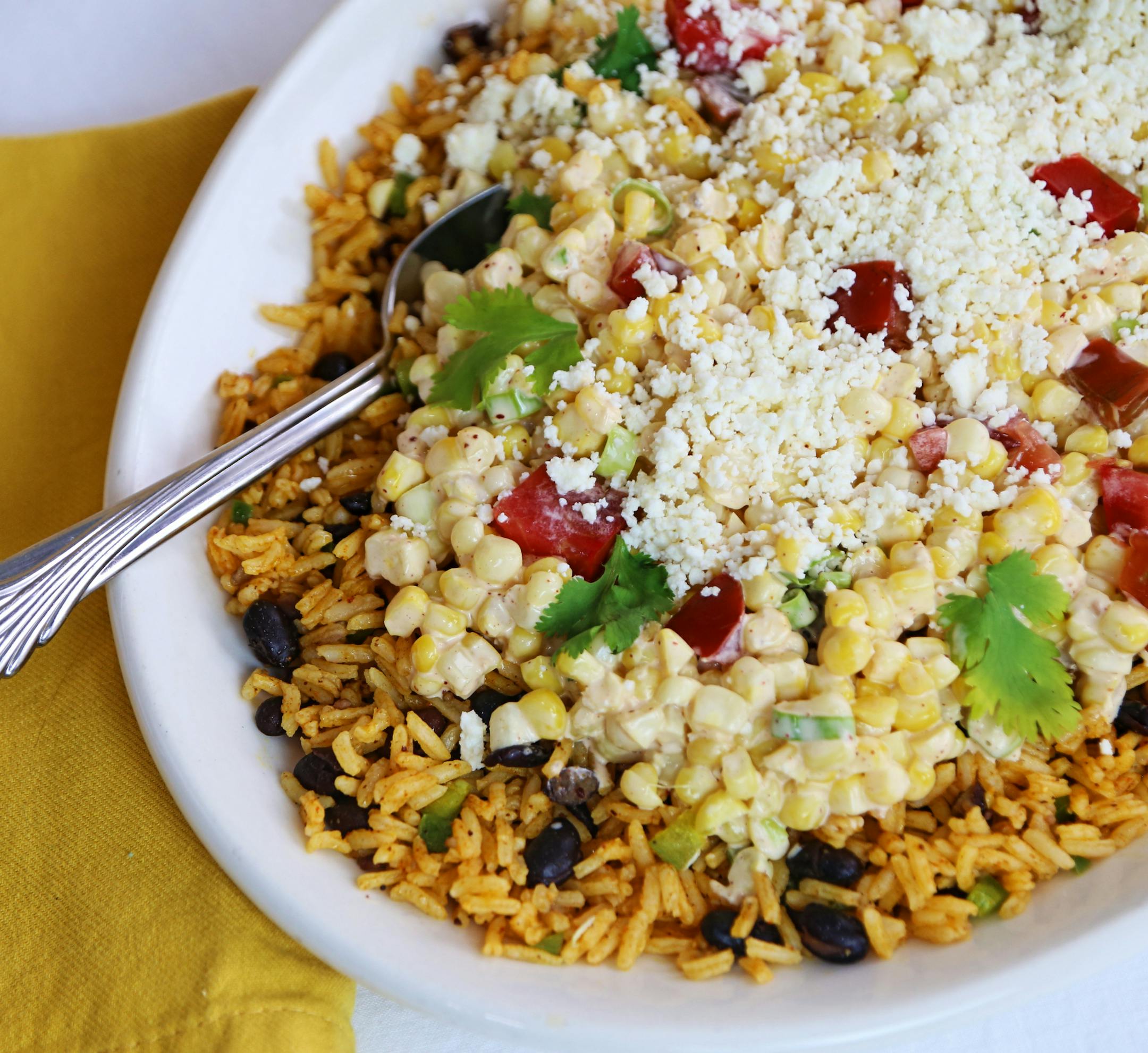 Yellow Rice and Elote Salad.