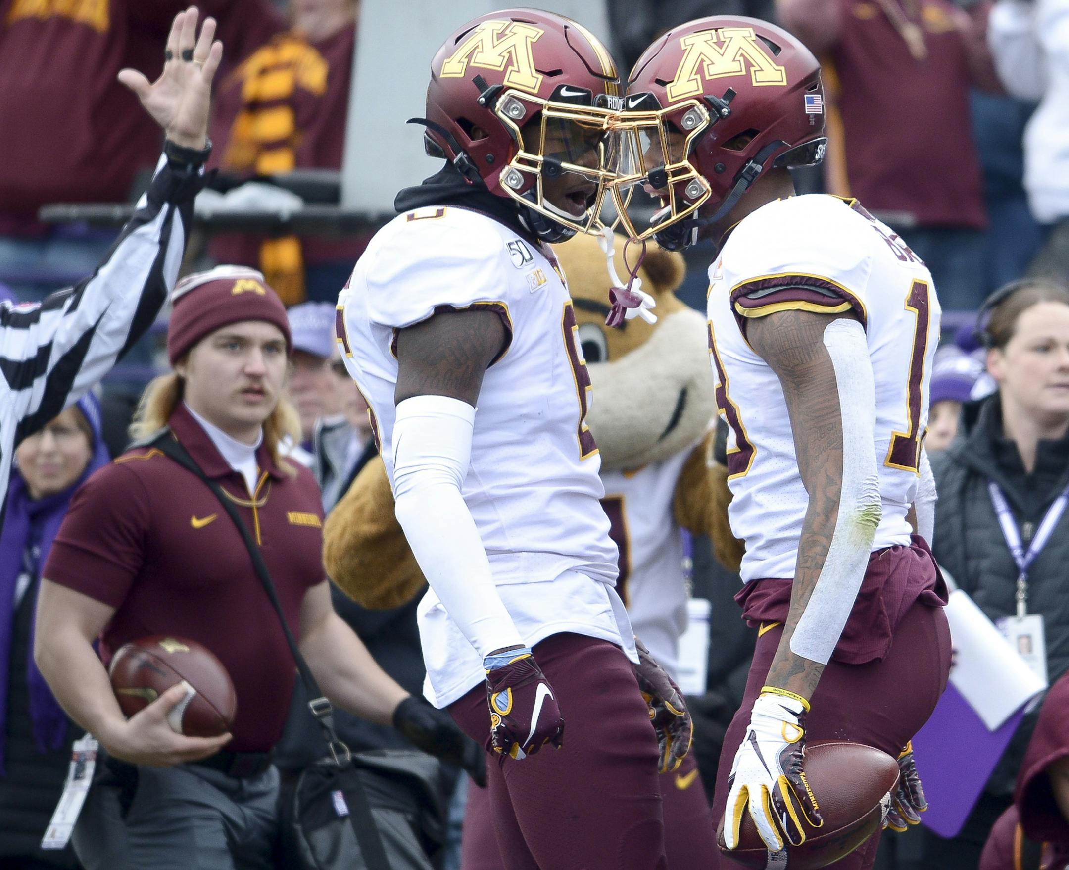 Minnesota Gophers wide receiver Tyler Johnson (6) and wide receiver Rashod Bateman (13) celebrated Bateman's first quarter touchdown against the Northwestern Wildcats. The Minnesota Gophers played the Northwestern Wildcats on Saturday, Nov. 23, 2019 at Ryan Field in Evanston, Ill. (Aaron Lavinsky/Minneapolis Star Tribune/TNS) ORG XMIT: 1497980