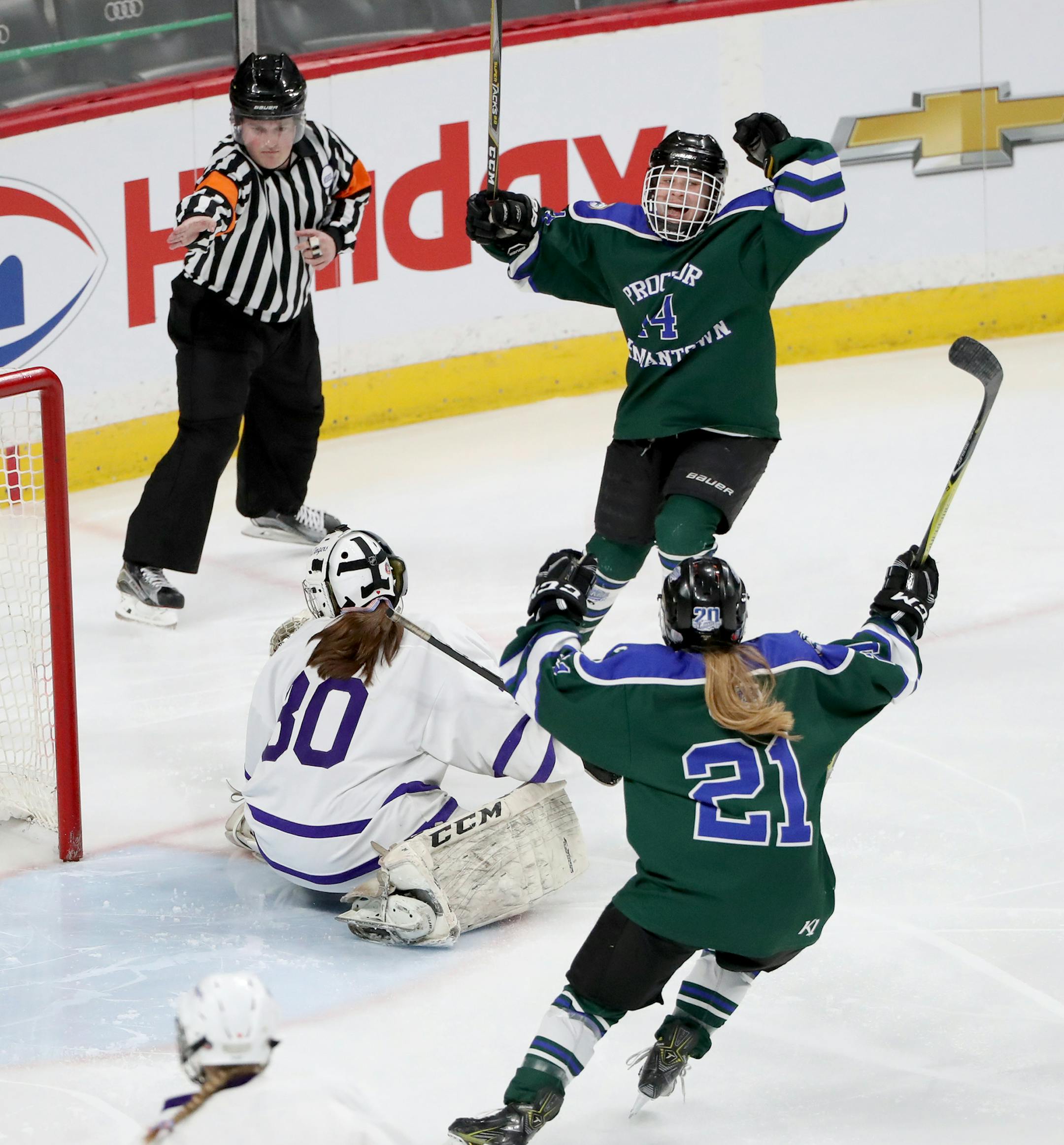 Proctor/Hermantown's Mariah Haedrich (14) celebrates her second period goal with teammate Megan Madill (21), past Red Wing goalie Tyler McGrath (30) during the Class 1A girls' hockey state tournament quarterfinals Wednesday, Feb. 21, 2018, at the Xcel Energy Center in St. Paul, MN. Proctor/Hermantown beat Red Wing 3-1.] DAVID JOLES ï david.joles@startribune.com Class 1A girls' hockey state tournament quarterfinals
