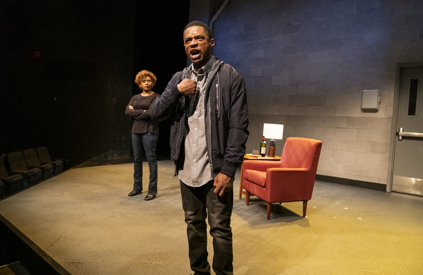 Kory LaQuess Pullam, center, plays Omari and Erika LaVonn plays Nya in "Pipeline" at Penumbra Theatre.