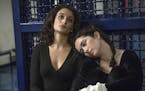 This image released by Magnolia Pictures shows Jenny Slate, left, and Abby Quinn in "Landline." (Linda Kallerus/Amazon Studios via AP)