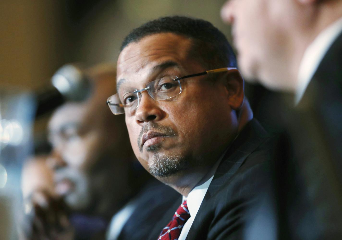 FILE - In this Dec. 2, 2016, file photo, Minnesota Rep. Keith Ellison listens during a forum on the future of the Democratic Party in Denver. Ellison (AP Photo/David Zalubowski, File)