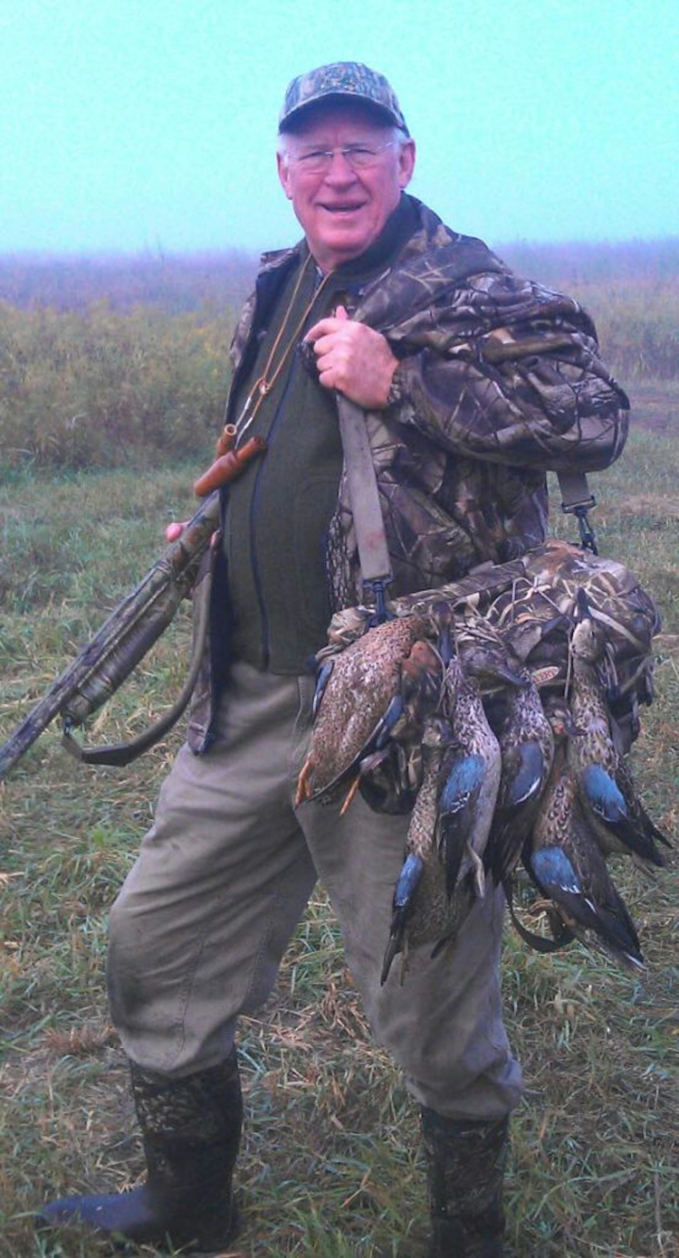Jim Killen with seven blue-winged teal he and his wife, Karen, shot on opening day on their land near Owatonna. The land is enrolled in conservation programs that will keep it as wildlife habitat forever.