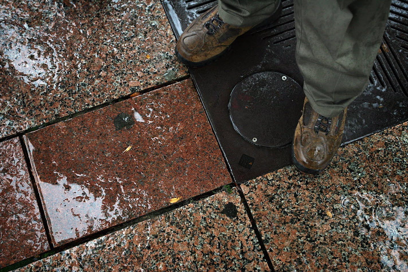 Rain fell on granite pavers on Nicollet Mall in downtown Minneapolis in 2010.