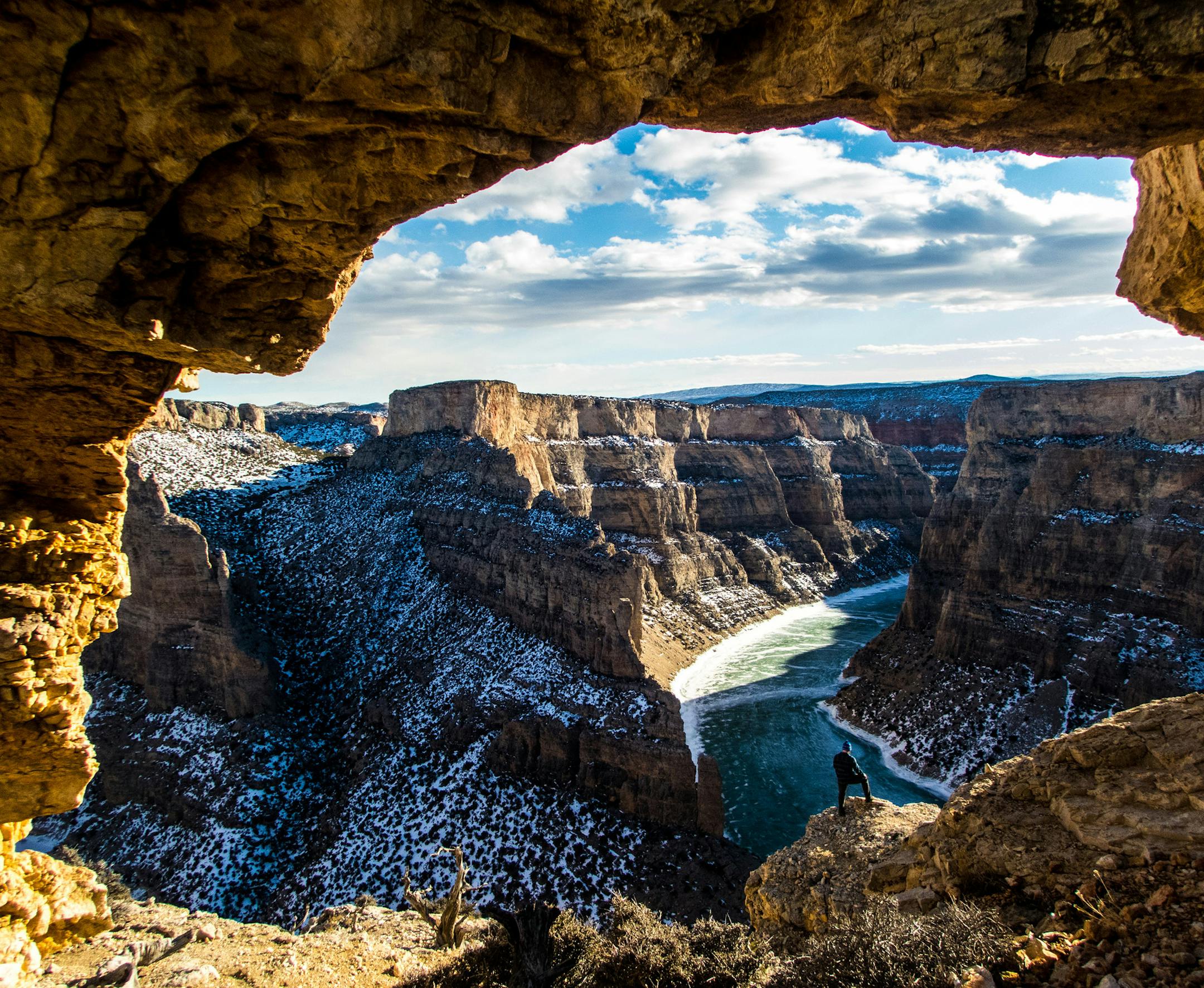 The Scene: I stand paralyzed starting at the vast canyon stretching as far as my eyes can see. Sun is breaking through the clouds just enough to light up some of the canyon. This canyon have been formed over millions of years and you can see the major sediment lines from past years. Spanning from Montana all the way into Wyoming before finally dumping all of its green but yet blue water into Bighorn Lake. It is truly a site to see. The Trip: My buddy and I went on a 2-week road trip. Roughly 422