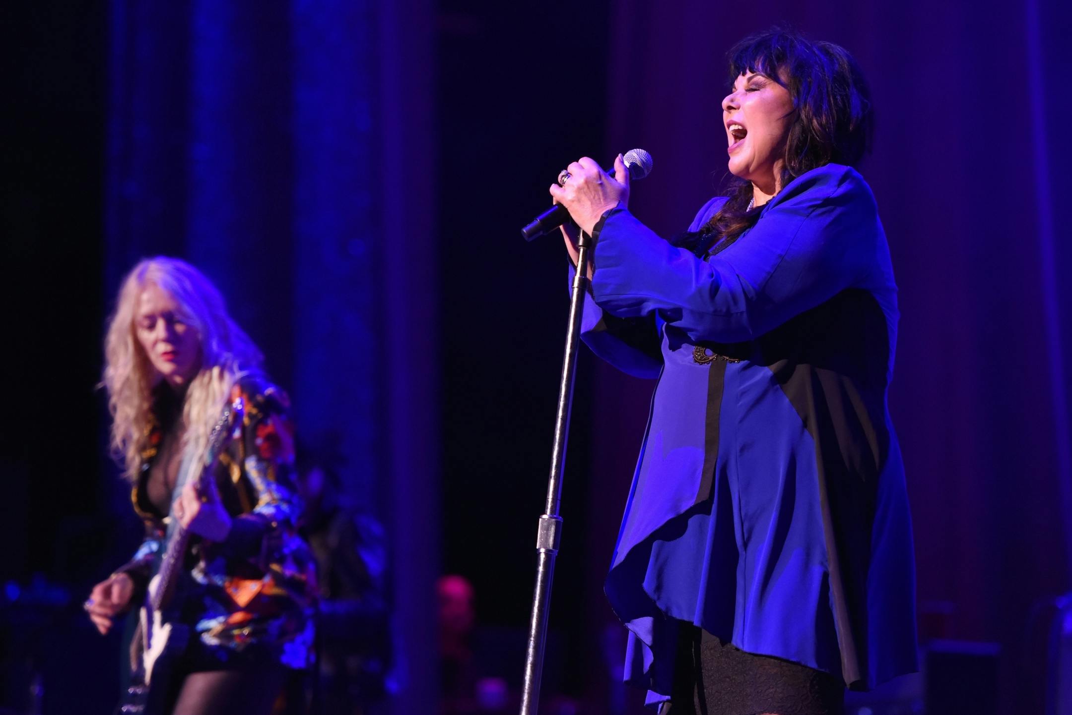 Nancy Wilson, left, and Ann Wilson of Heart perform during the "Love Alive Tour" at the Hollywood Casino Amphitheatre on Thursday, July 11, 2019, in Chicago.