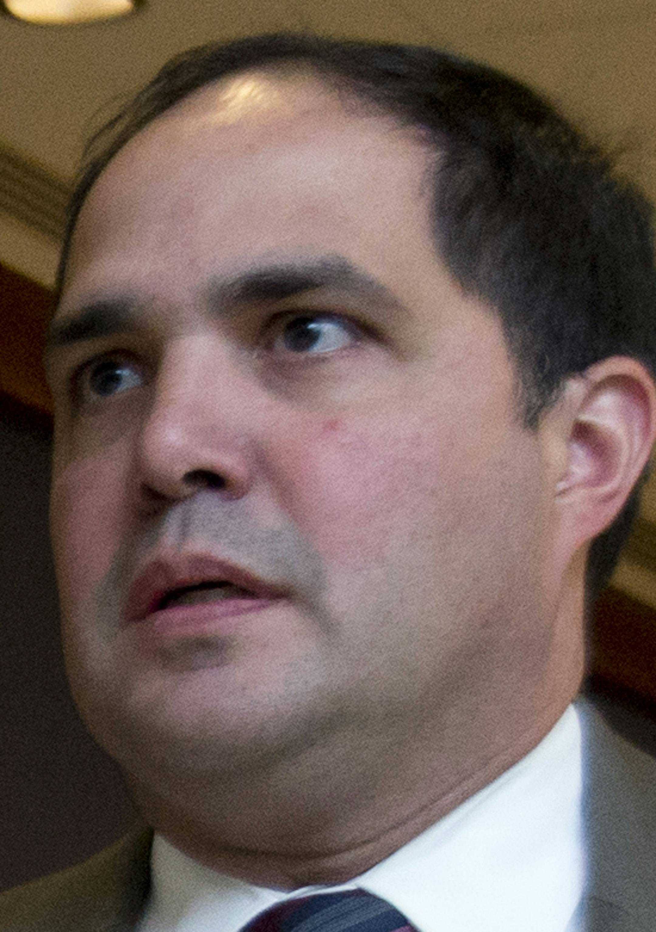 FILE - This June 11, 2013 file photo shows Rep. Michele Bachmann, R-Minn., arriving with staff member Javier Sanchez on Capitol Hill in Washington. Sanchez has been arrested and charged with thefts that took place in a House office building. A spokesman for the U.S. Capitol Police says 37-year-old Javier Sanchez of Virginia was arrested last Thursday, July 11, 2013. (AP Photo/Manuel Balce Ceneta, file) ORG XMIT: MIN2013082617001951