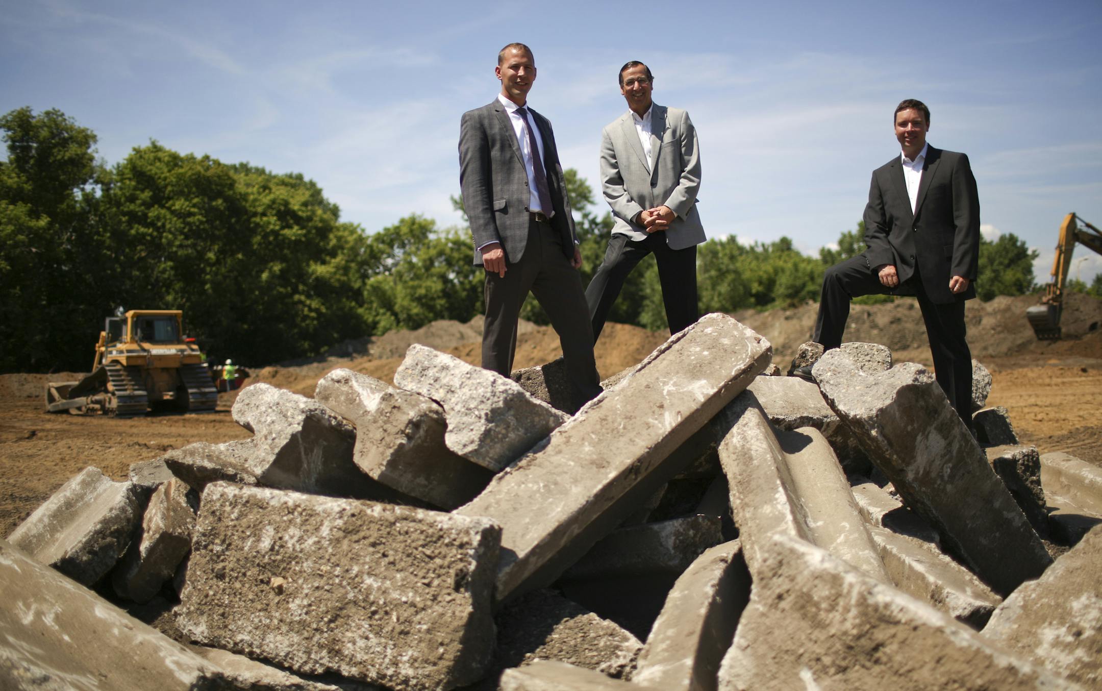 Crushed during the Great Recession, developers are now pitching spec buildings -- those with no committed tenants -- to local municipalities. Eric Simmer, Lonnie Provencher, and Greg Miller of Interstate Partners are developing an industrial spec building at Meadow View Industrial Park in Eagan. Lonnie Provencher, Greg Miller, and Eric Simmer, from left, at the site in Eagan Wednesday afternoon, July 24, 2013, where they recently broke ground on the speculative building. ] JEFF WHEELER ‚&