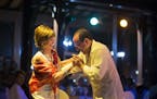 Marilyn Nelson dances with Minnesota Orchestra trumpet player Manny Laureano during dinner at the Hotel Nacional in Havana, Cuba on Wednesday, May 13,