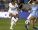 Stanford's Catarina Macario, left, shoots while being defended by North Carolina's Maycee Bell during the first half of a soccer match in San Jose, Ca
