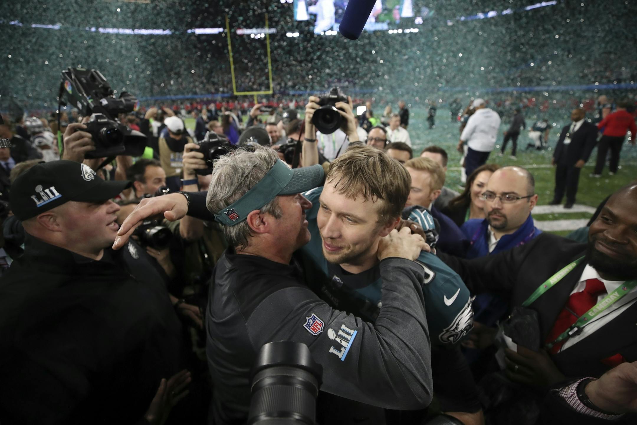 Philadelphia Eagles coach Doug Pederson, left, embraced Eagles quarterback Nick Foles after their team won Super Bowl LII. Foles was named the game's MVP. He took over as the Eagles starter after Carson Wentz went out late in the season with a knee injury.