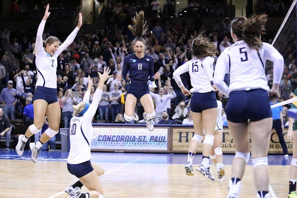 Concordia (St. Paul) players celebrate match point on Saturday afternoon in the national championship.