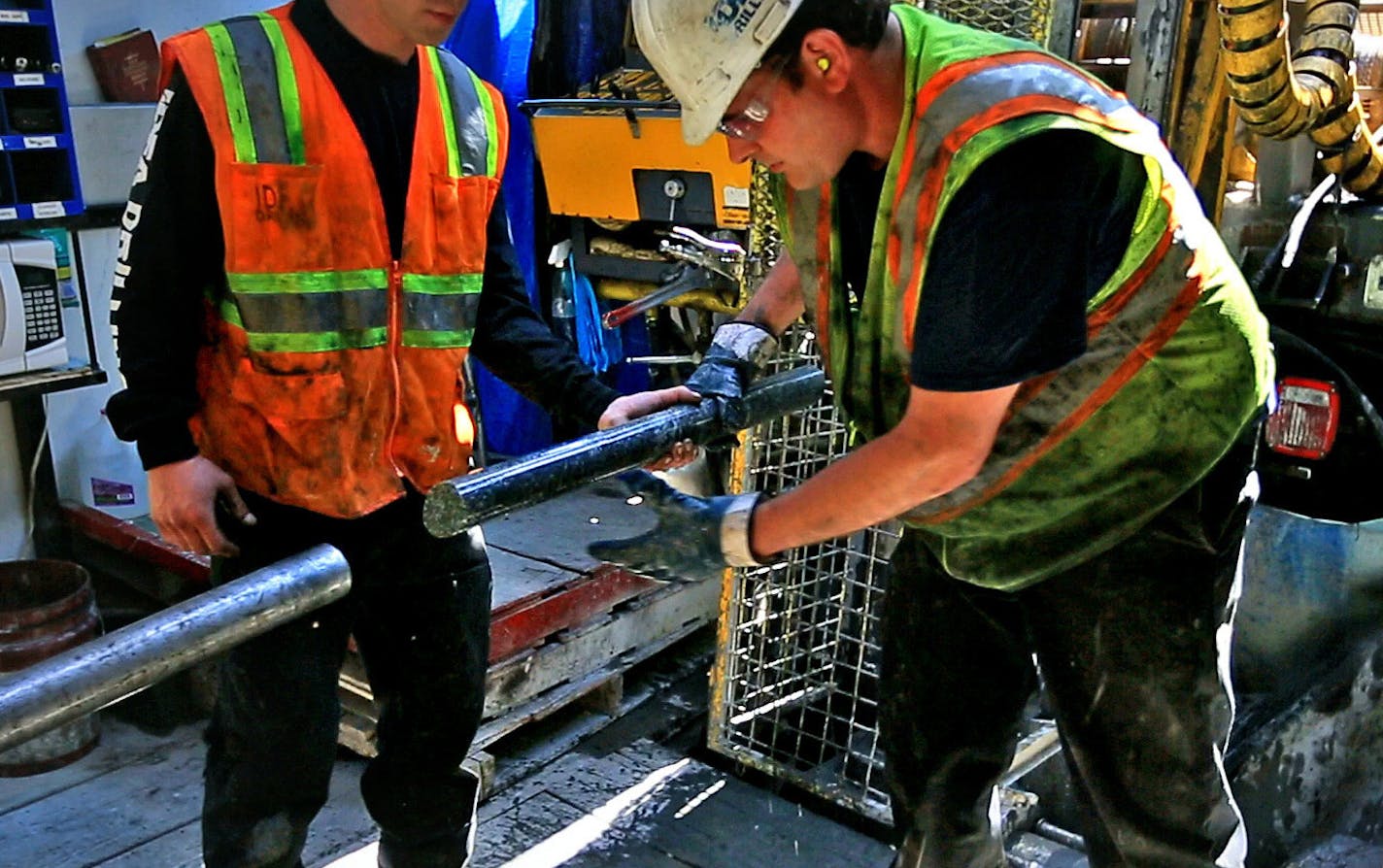 Not since the battle of 1978 to designate the BWCA as a wilderness area has the town of Ely been so divided. This time it's the possibility of Copper/Nickel mining and the promised jobs it brings -vs- the fear that mining so close to the BWCA could contaminate the water. Here, drillers for Twin Metals, at a site near the Kiwishiwi River, pull a core sample from the drill pipe. ] BRIAN PETERSON &#x2022; brianp@startribune.com ELY, MN - 05/30/2013 ORG XMIT: MIN1305310946521019 ORG XMIT: MIN1504142