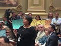 Danielle Shelton Walczak, director of the Complaint Investigations Division for the Minneapolis Department of Civil Rights, addresses City Council mem