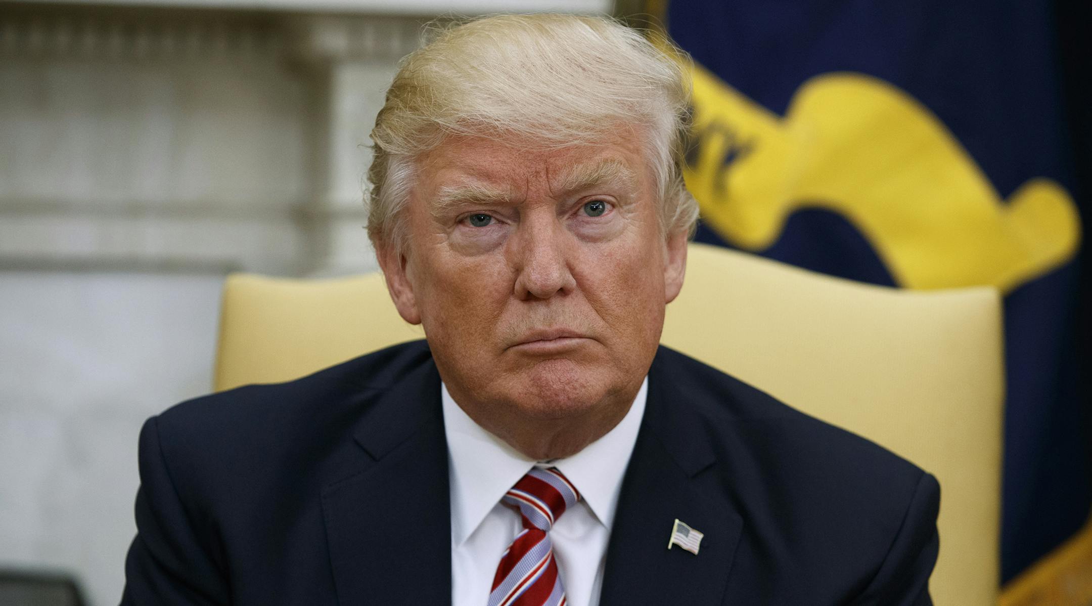President Donald Trump listens during his meeting with Turkish President Recep Tayyip Erdogan in the Oval Office of the White House in Washington, Tuesday, May 16, 2017. (AP Photo/Evan Vucci) ORG XMIT: MIN2017051613330721