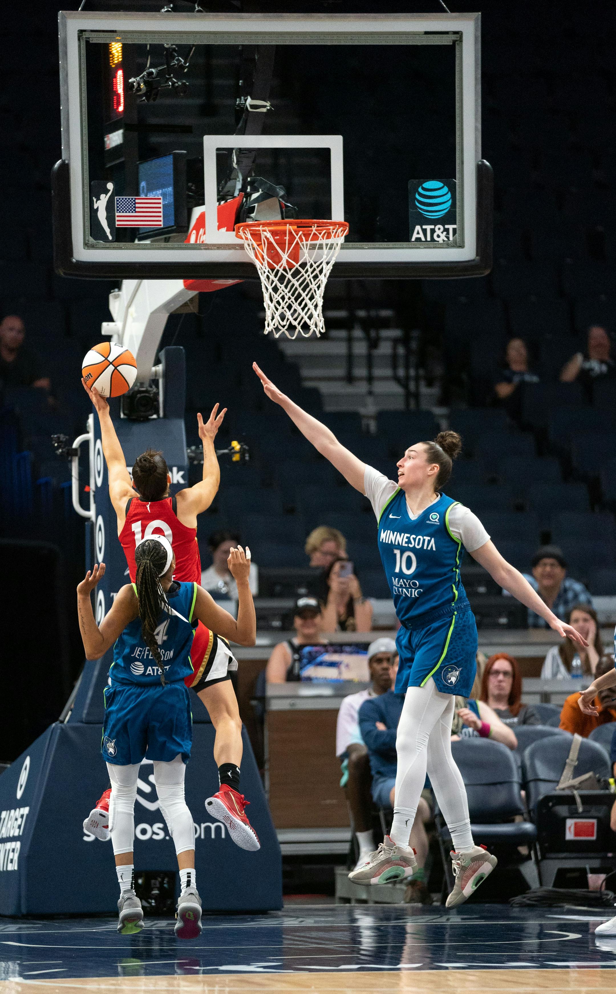 Las Vegas Aces guard Kelsey Plum (10) shoots the ball while Minnesota Lynx forward Jessica Shepard (10)  tries to intercept during the second half of the game.