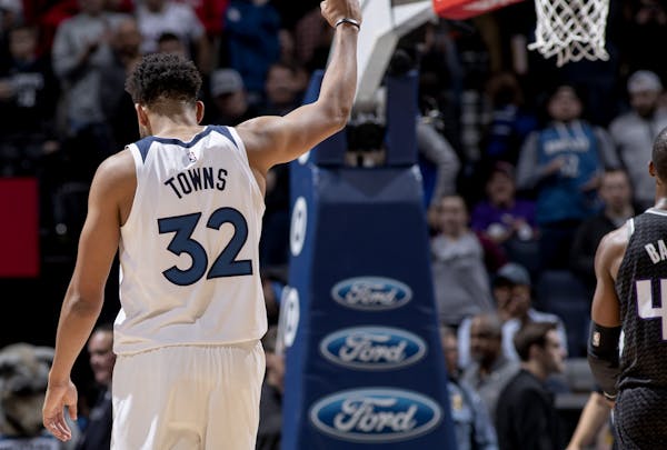 Karl-Anthony Towns celebrated at the end of the game.