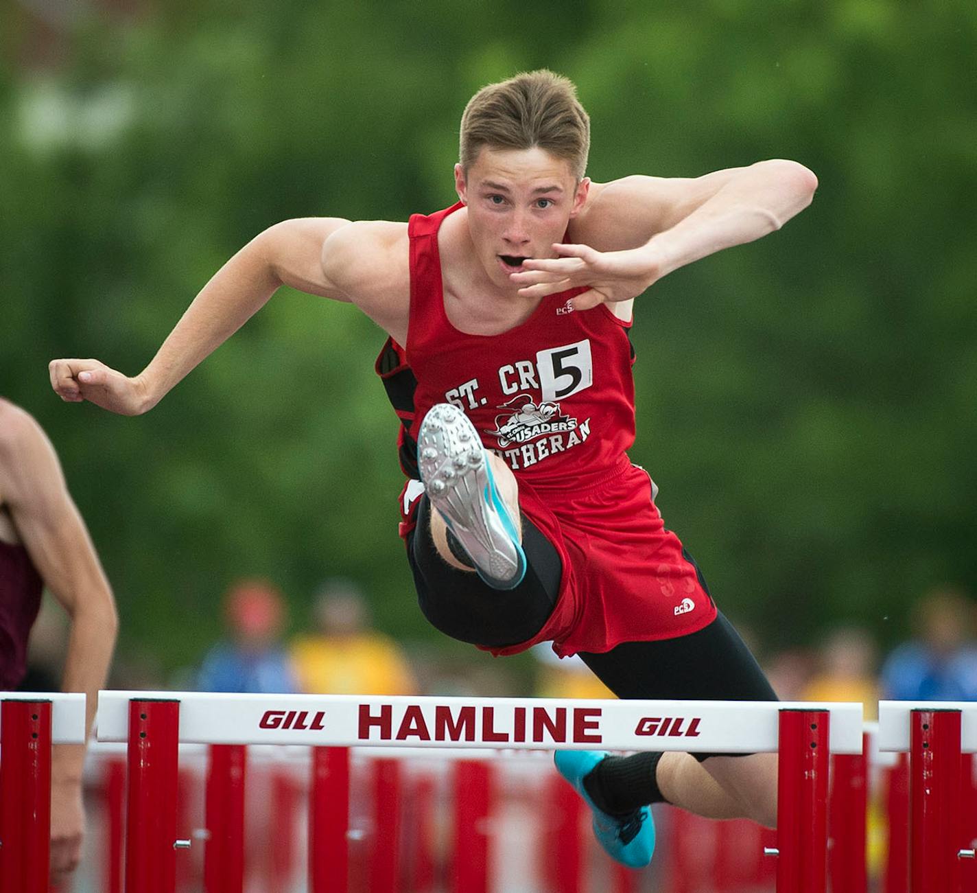 St. Croix Lutheran's Jon Tollefson won the 1A 110 meter hurdles title with a time of 14.61 Saturday.