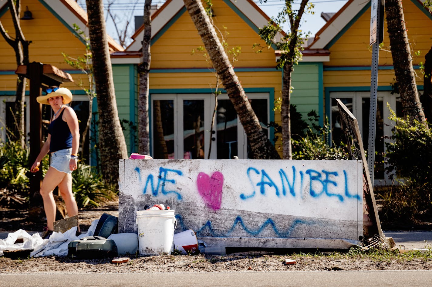 Repairs continue on buildings damaged by Hurricane Ian on Sanibel Island, Fla., Feb. 9, 2023. Communities like Fort Myers Beach, Sanibel and Captiva, devastated by the storm, are struggling to rebuild the hotel rooms, restaurants and rental units that keep their economy alive. (Scott McIntyre/The New York Times)