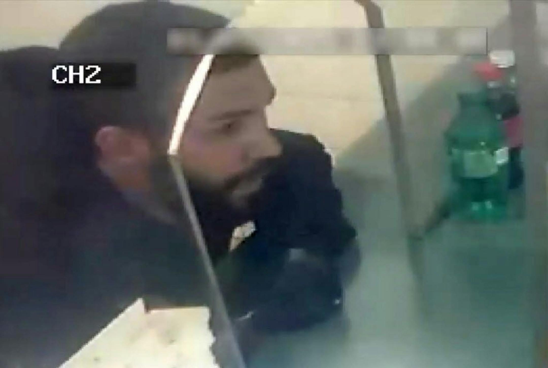 A suspect, shown on surveillance video, in the shooting and wounding of two New York City police officers in the Bronx.