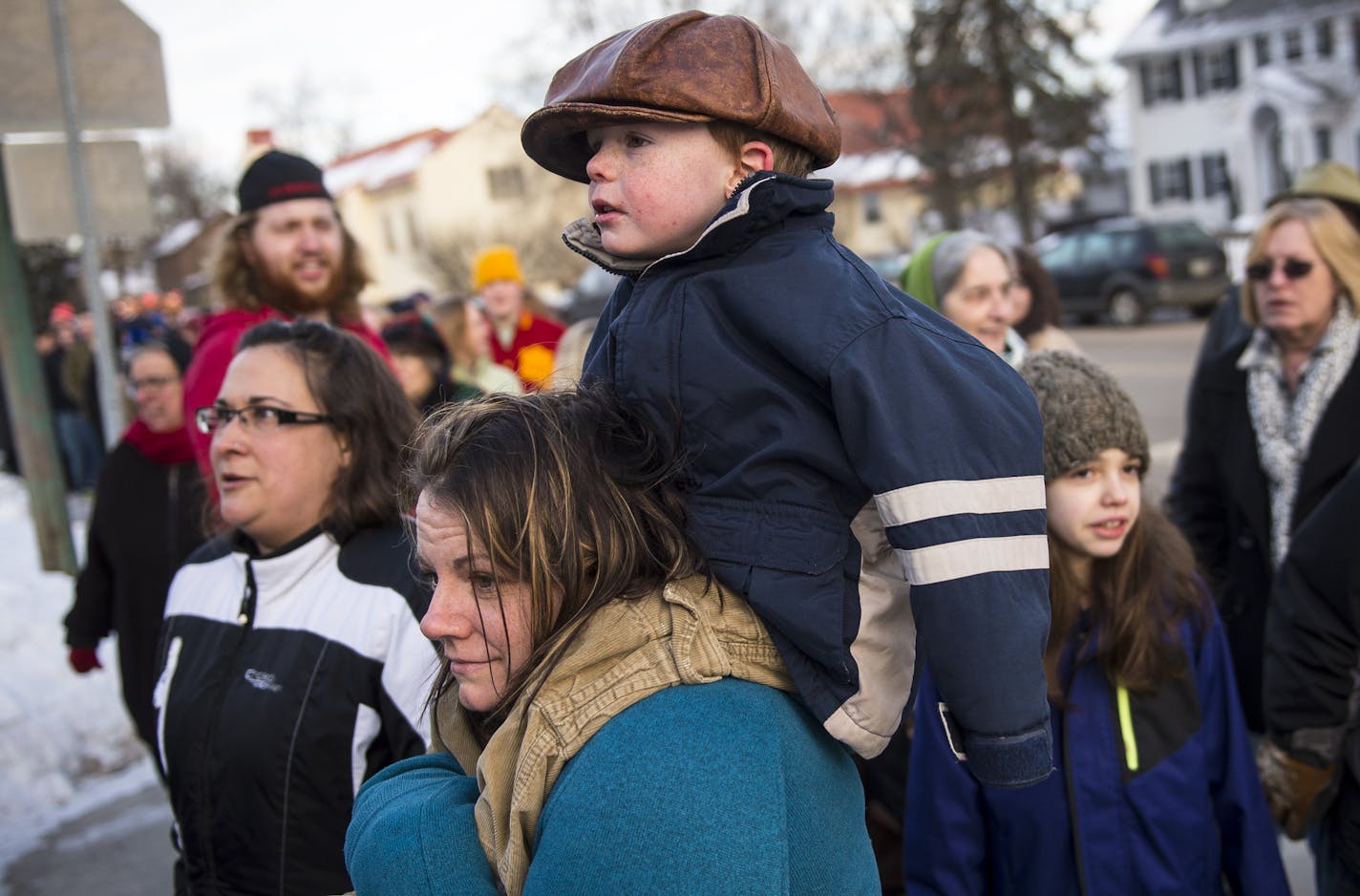 Bernie Sanders supporter Emma Tufts, of Nevis, and her son James, 4, waited in line outside Hibbing High School Friday morning. ] (AARON LAVINSKY/STAR TRIBUNE) aaron.lavinsky@startribune.com Democratic presidential candidate Bernie Sanders held a rally in the Iron Range town of Hibbing, Minn., on Friday, Feb. 26, 2016 at Hibbing High School.