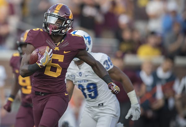 Minnesota's wide receiver Tyler Johnson ran for a touchdown in the first quarter as they took on the Buffalo Bulls at TCF Bank Stadium, Thursday, Augu