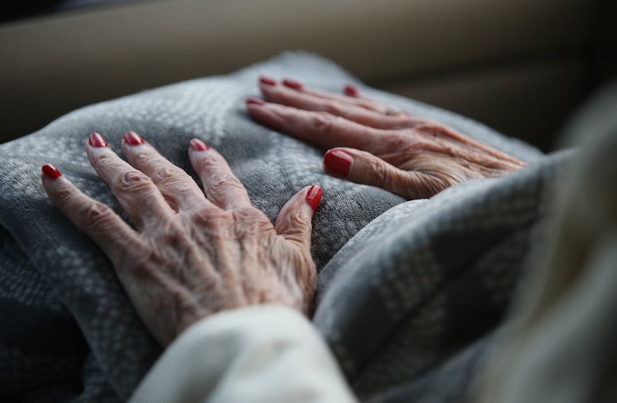 Alice Tolzmann's nails are freshly painted as she rides with her daughter Elizabeth Radichel to watch her grand daughter Christina Radichel in a tennis match Thursday, Sept. 29, 2017, in Golden Valley, MN.