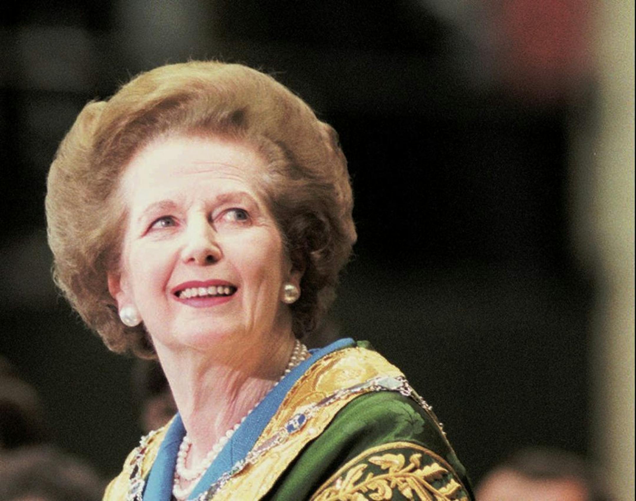 Former British Prime Minister Margaret Thatcher smiles as the audience gives her a standing ovation before her commencement address at William and Mary Hall in Williamsburg, Va., Sunday, May 11, 1997. In a speech Monday, the Iron Lady said the Labor Party won two weeks ago partly by adopting policies of the Conservative Party she led to power in 1979, including privatization and lower taxes.