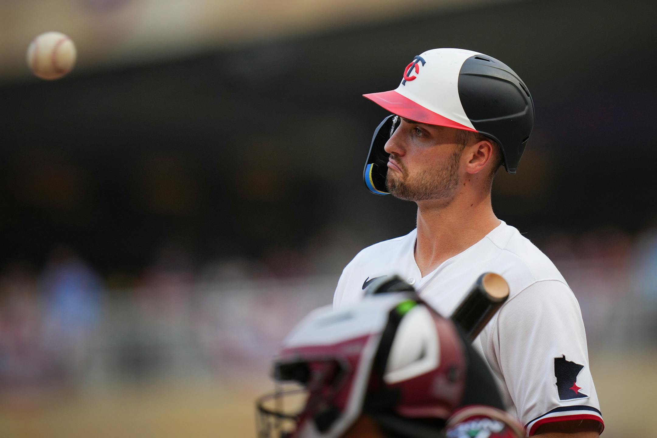 Minnesota Twins right fielder Matt Wallner (38) reacts after the home plate umpire made a call to the benefit of Arizona Diamondbacks starting pitcher Ryne Nelson (19).