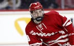 Wisconsin's Cole Caufield during an NCAA hockey game against the Boston College on Friday, Oct. 11, 2019 in Chestnut Hill, Mass. (AP Photo/Winslow Tow