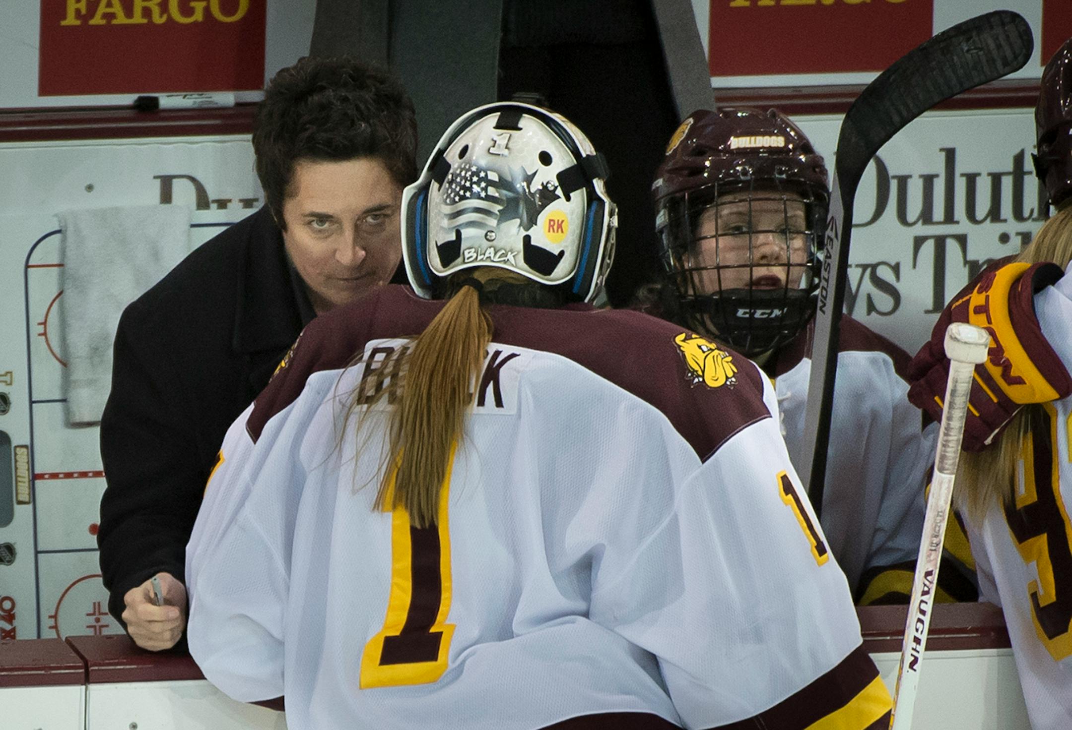 University of Minnesota Duluth head coach Shannon Miller talks with goalie Kayla Black (1) before an overtime shootout on Saturday night against the University of North Dakota. ] (Aaron Lavinsky | StarTribune) University of Minnesota Duluth told women's hockey head coach Shannon Miller that this season would be the las of her successful run as the Bulldog's coach. After five national championships, an NCAA record, and 11 Frozen Four Victories, Miller, the highest-paid coach in women's hockey, wa