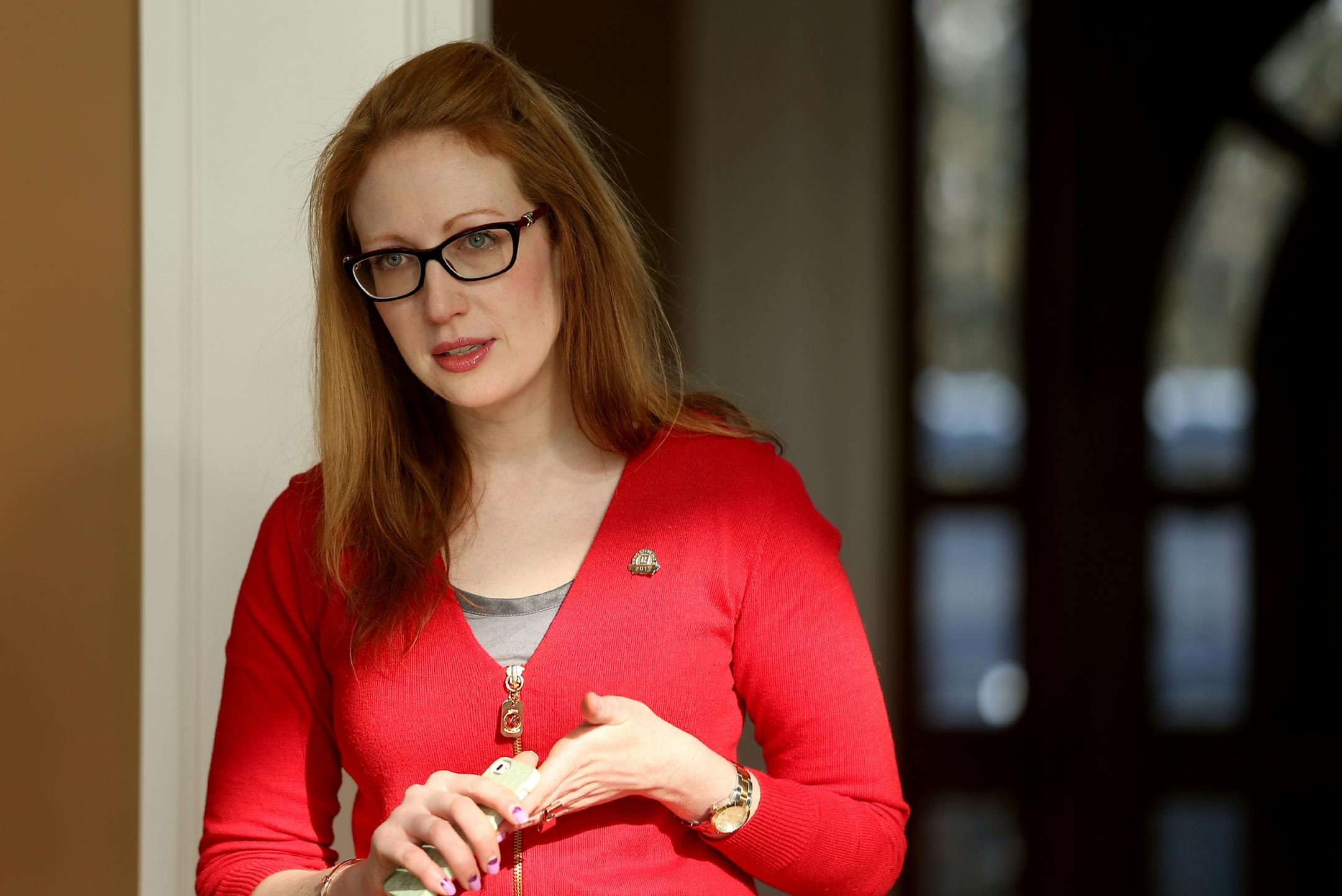 Julia Parenteau (red) of the Minneapolis Area Association of Realtors spoke to RE/MAX agents about the real estate market. Mound, MN on February 12, 2014. ] JOELKOYAMA‚Ä¢jkoyama@startribune 764446 Home buyers in the Twin Cities metro took a breather during January, confirming predictions that the housing recovery will cool this year. Story will be based on the January sales report from the Minneapolis Area Association of Realtors, which will be released Wednesday.