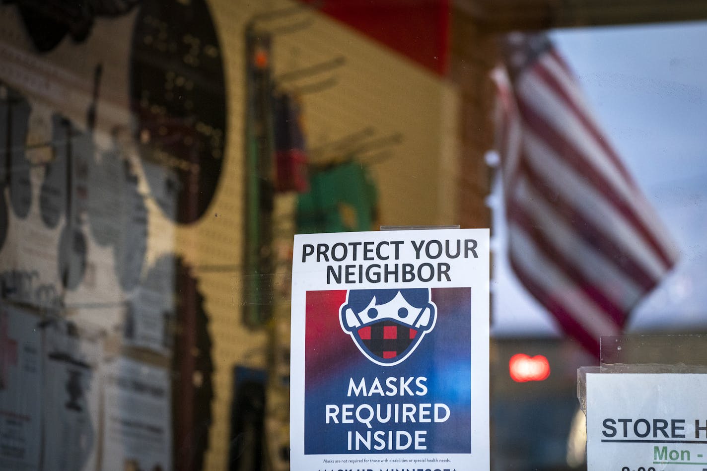 A sign outside the True Value hardware store in downtown Spring Grove reminded people to wear masks. ] LEILA NAVIDI • leila.navidi@startribune.com BACKGROUND INFORMATION: Houston County in southeastern Minnesota on Wednesday, October 21, 2020. As COVID-19 continues to spread across the country, rural areas are being hit harder than ever before, Houston County included. In the past six weeks, the case count has more than doubled and the virus claimed its first victim.