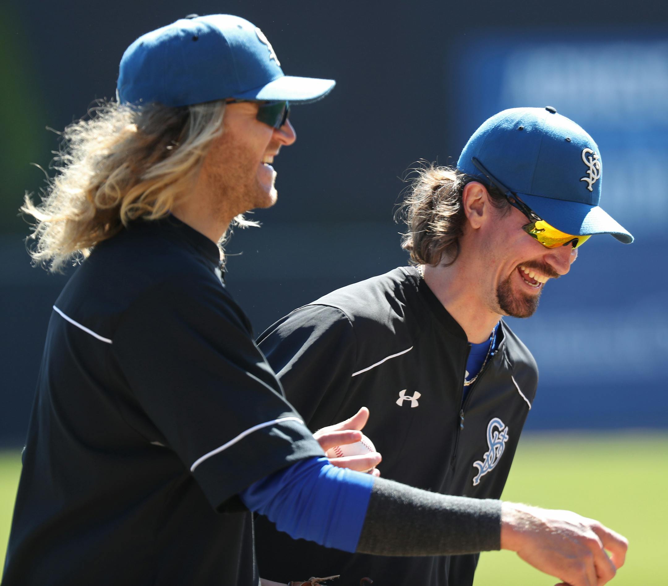 Pitchers Robert Coe (right) and Mark Hamburger laugh as they left the field at the completion of practice.] Shari L. Gross ï sgross@startribune.com The St. Paul Saints held their first open workout of the season on CHS Field in St. Paul, Minn. on Saturday, May 6, 2017.