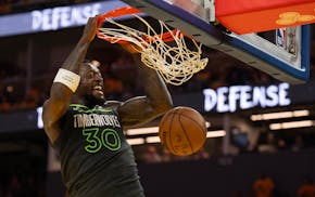 Wolves forward Julius Randle dunks during the fourth quarter Saturday night in San Francisco. Minnesota beat Golden State 102-97 in Game 3 of their We