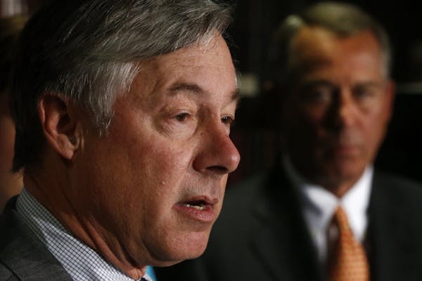 Rep. Fred Upton, R-Mich., which has responsibility over matters relating to healthcare, left, accompanied by House Speaker John Boehner of Ohio, speak