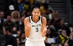 Las Vegas Aces forward Candace Parker reacts during the first half of a WNBA basketball game against the Seattle Storm, May 20, 2023, in Seattle.
