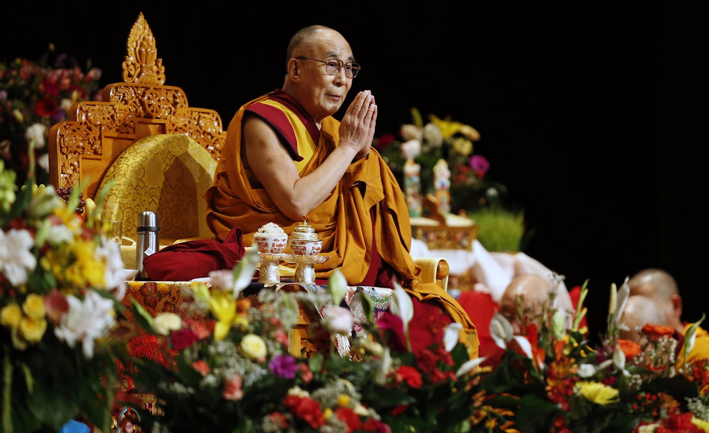 At the Minneapolis Convention Center, the Dalai Lama addressed a mostly Tibetan audience as part of a stay in Minnesota that includes visiting the Mayo Clinic for his health treatment.] Richard Tsong-Taatarii/rtsong-taatarii@startribune.com