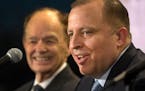 Wolves coach and president of basketball operations Tom Thibodeau, right, with Wolves owner Glen Taylor.