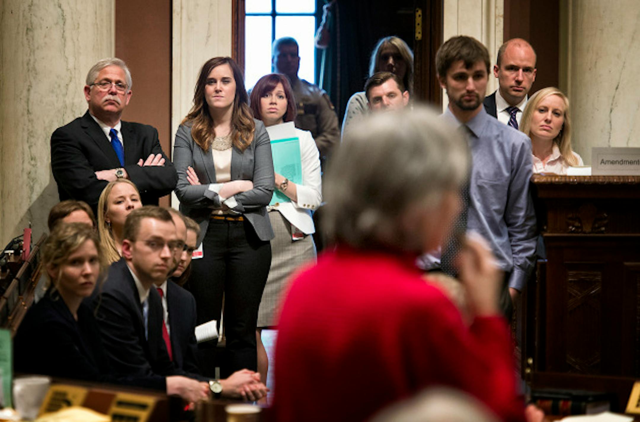 House DFL staffers listened as Rep. Karen Clark delivered her final comments on the marriage bill.   Thursday, May 9, 2013.     ]   GLEN STUBBE * gstubbe@startribune.com