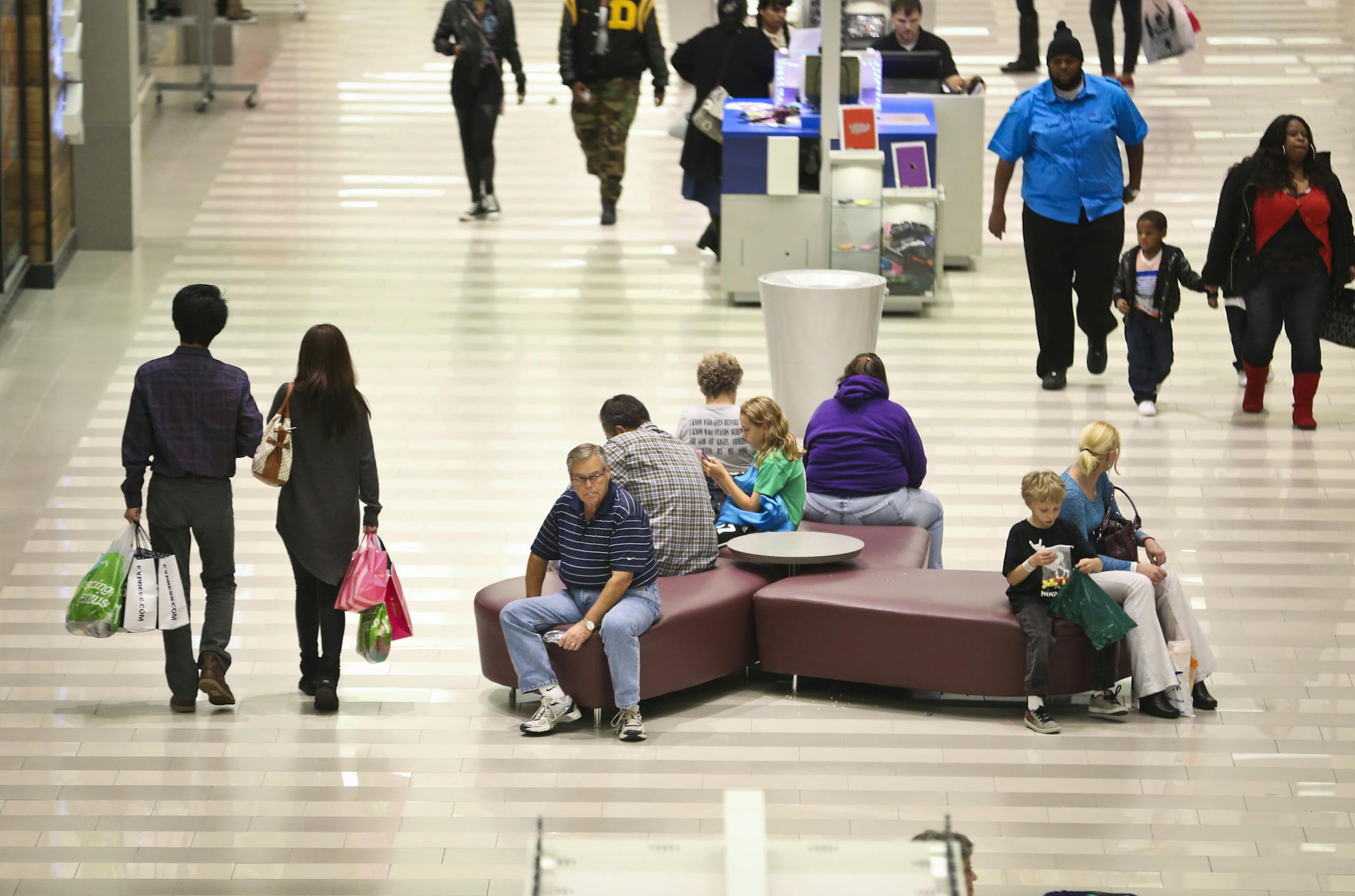 Shoppers at the Mall of America in Bloomington, Minn., on October 17, 2013. The shaky consumer confidence is pummeling sales forecasts for the holiday season, a crucial period that can account for up to 40 percent of a retailer's annual revenue. ] RENEE JONES SCHNEIDER • reneejones@startribune.com