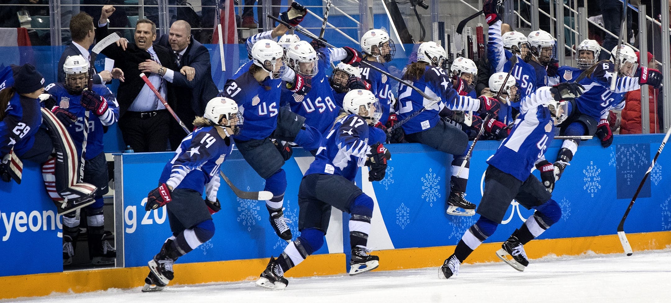USA celebrated after beating Canada in a shootout to win the gold medal.