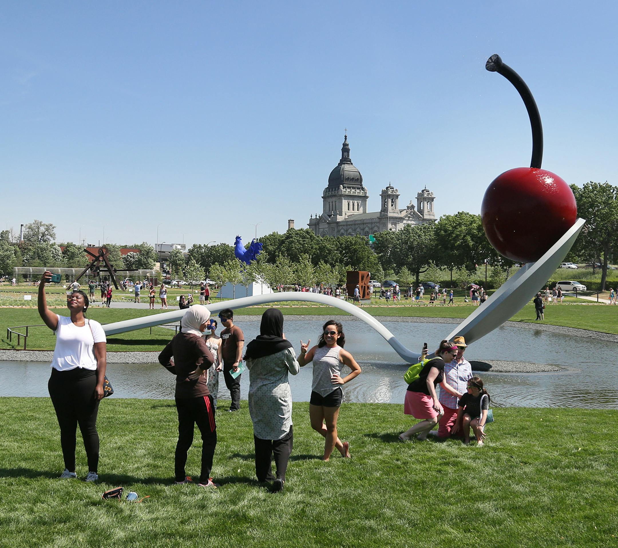 The reopened Minneapolis Sculpture Garden drew crowds that got to see &#x201c;Spoonbridge and Cherry&#x201d; up close again. The trees to the north of the iconic sculpture, first erected at the Walker in 1985, were removed because they blocked the visual connection between the garden&#x2019;s north and sound ends.