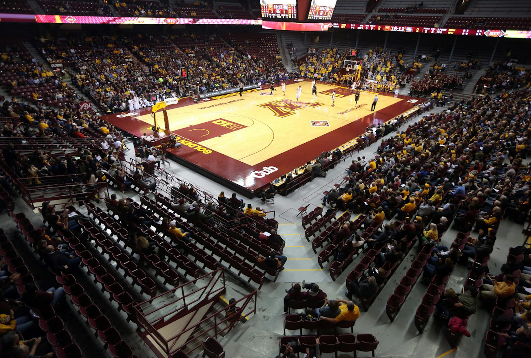 Empty seats were sprinkled around the lower bowl at Williams Arena during the first half against High Point. ] (KYNDELL HARKNESS/STAR TRIBUNE) kyndell.harkness@startribune.com First round of the National Invitational Tournament at Williams Arena in Minneapolis Min, Tuesday March 18, 2014.