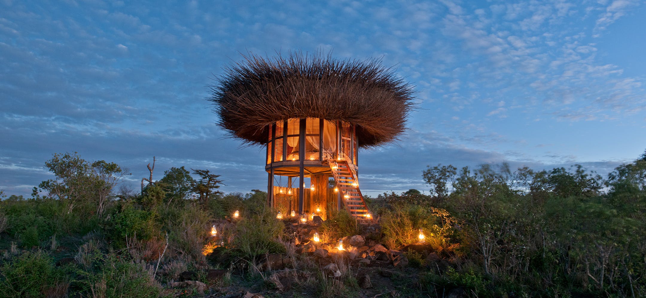 Segera Retreat's Nay Palad, best described as resembling a twig-filled bird nest, is built close to a river so its guests have up-close views of wildlife slaking their thirst. (Segera Retreat/TNS)
