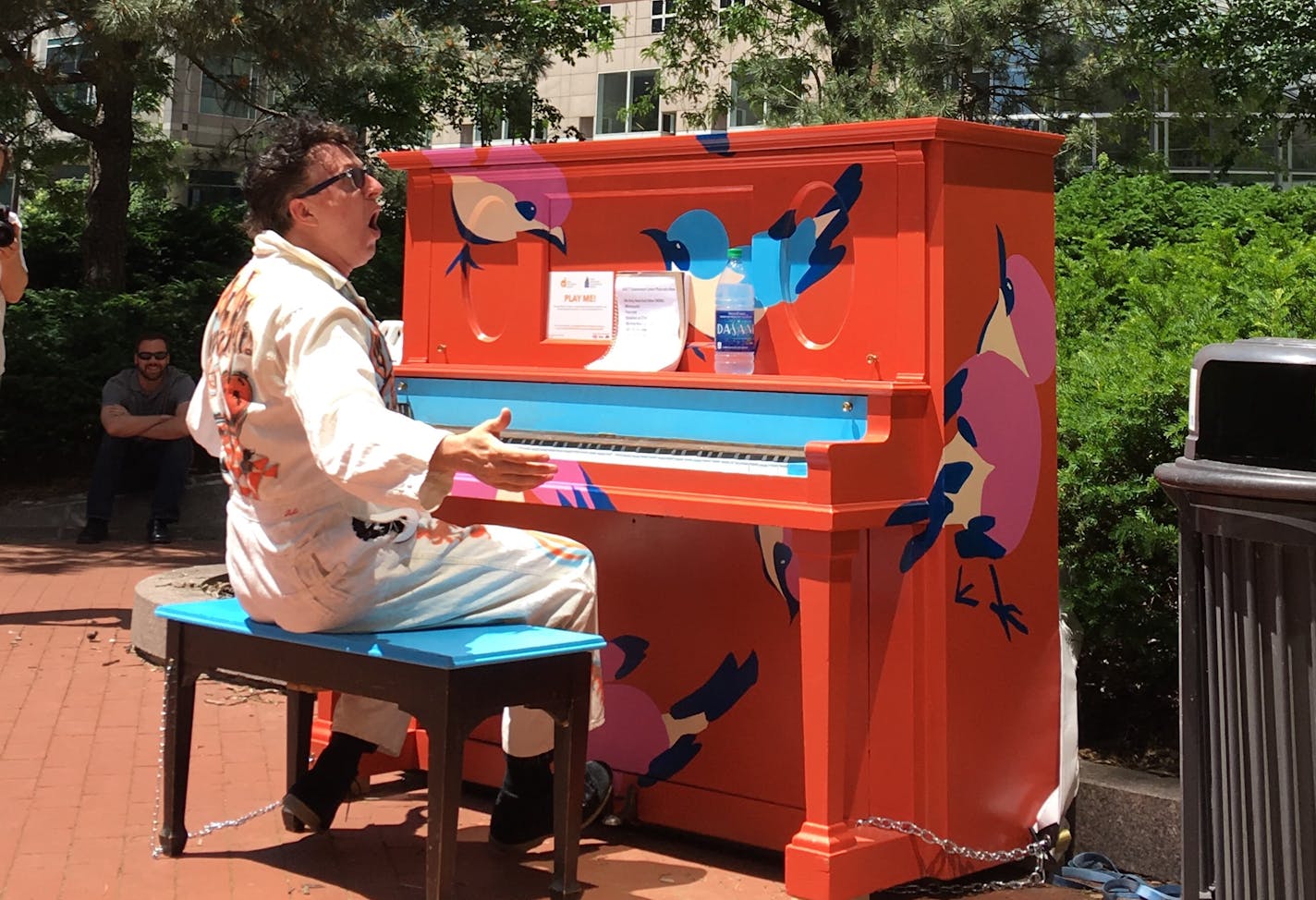 Mark Mallman performed outside the Government Center on Tuesday to promote Pianos on Parade.