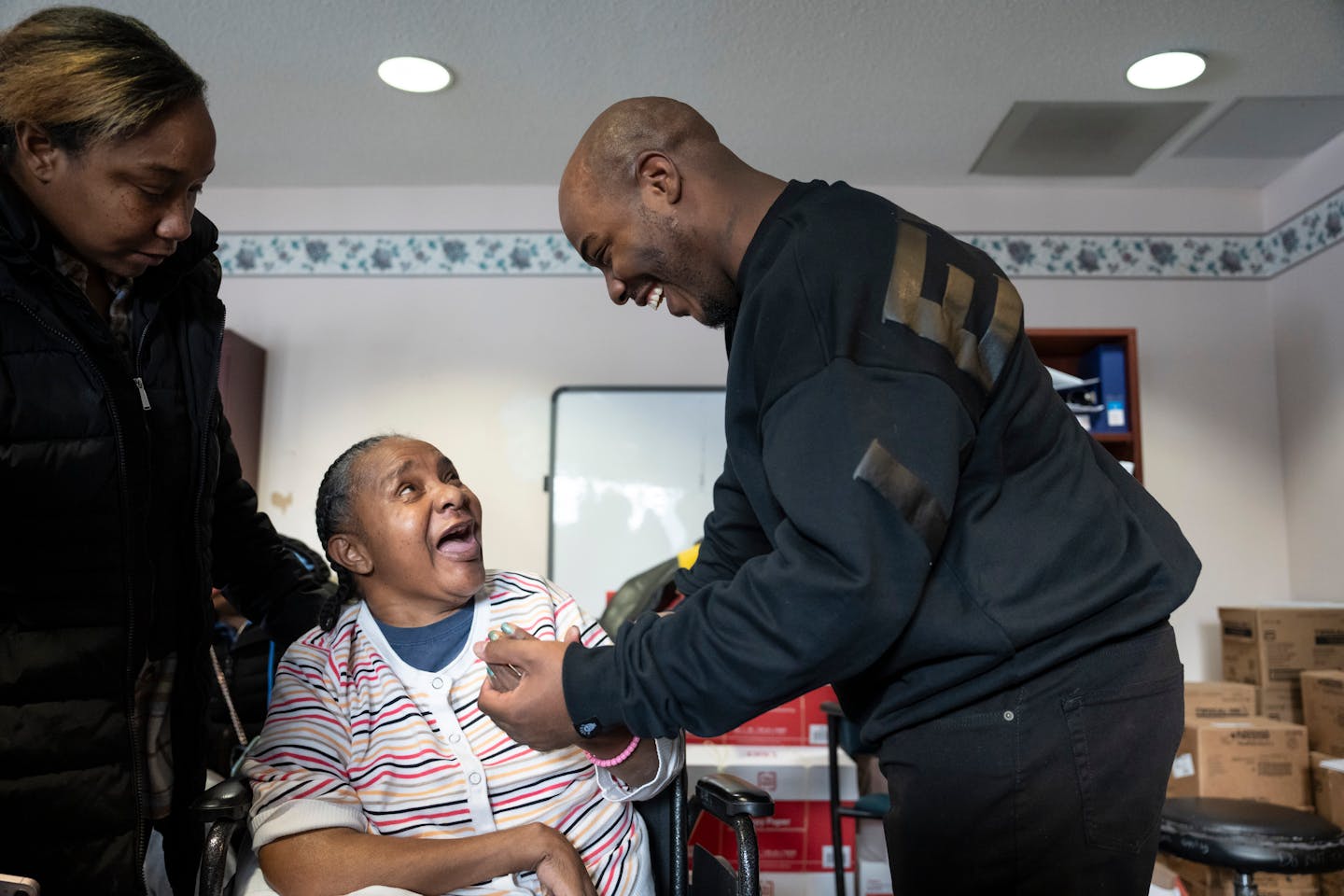 Marvin Haynes talks with his mother Sharon Shipp after leaving a press conference where he had just been released from prison on Monday, Dec. 11, 2023 in Minneapolis, Minn. After serving 20 years in prison from the age 16, Marvin Haynes was exonerated of a murder conviction and released on Monday, Dec. 11, 2023. Shipp had a stroke several years back that left her disabled and she now lives in a nursing home. He had not seen her since before her stroke.