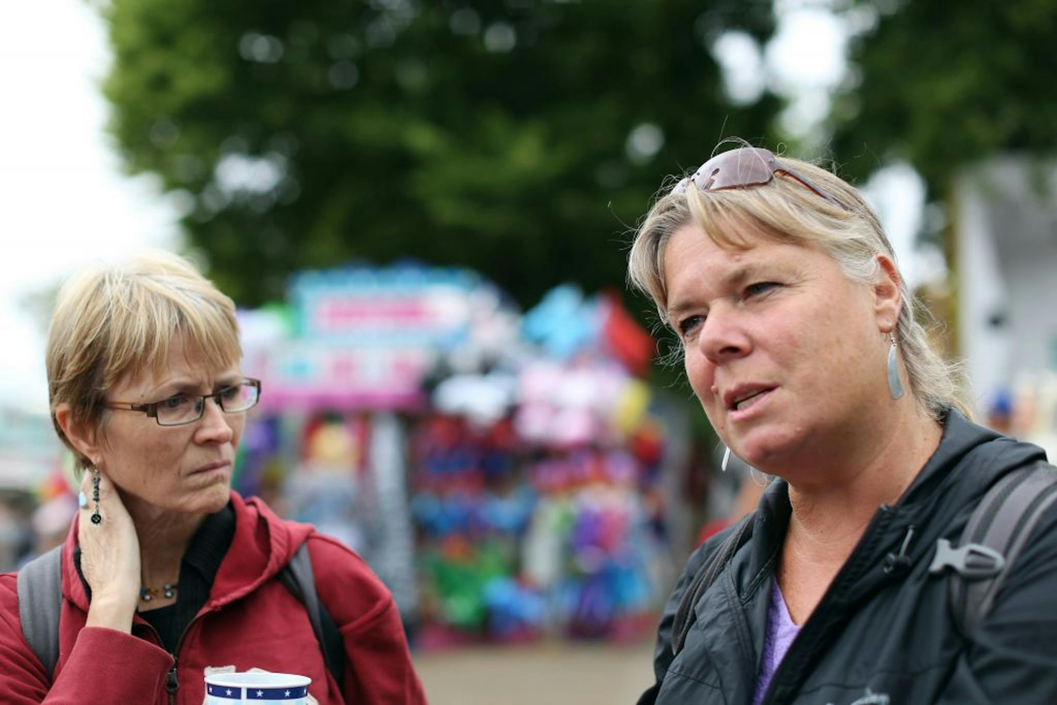 Grit Youngquist left of St. Paul and her friend Fran Anker of Minneapolis were not sure what actions the United States should take against the government of Syria at the state fair Monday September 02 ,2013 in Falcon Heights , MN.