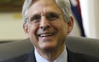 FILE - In this May 10, 2016 file photo, Supreme Court nominee Merrick Garland smiles on Capitol Hill in Washington. Senate confirmation of President B
